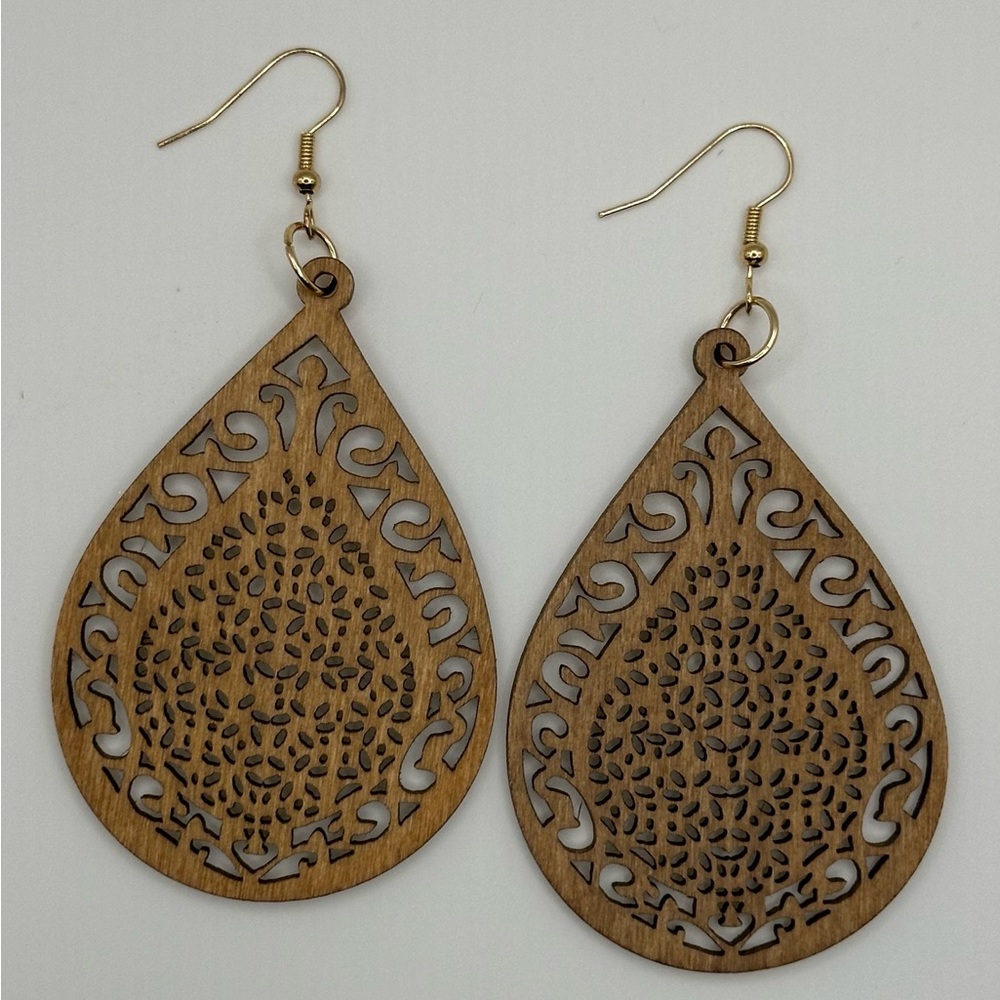 Boho, wooden, laser cut earrings. Brand new, never worn. Gold fishhooks.